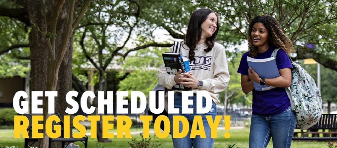 Registration is now open - Two students walking on campus